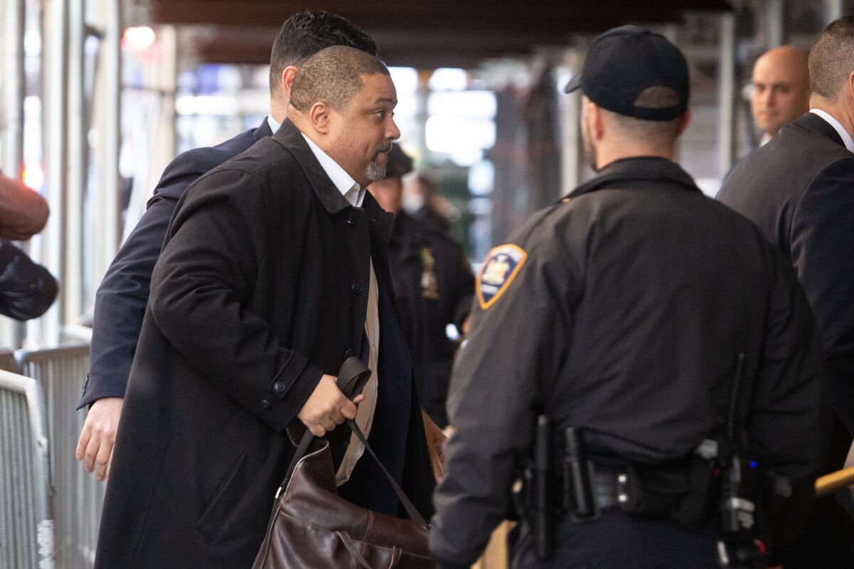 Manhattan District Attorney Alvin Bragg enters the Manhattan Criminal Courthouse on Monday.