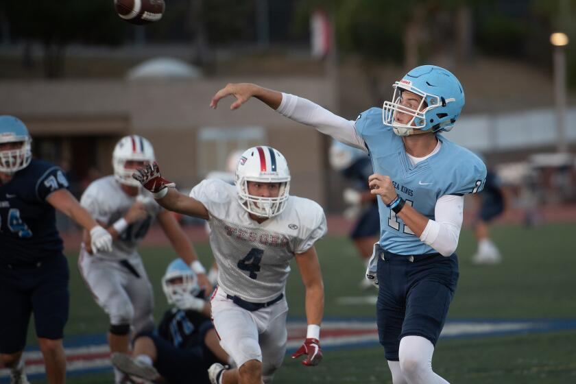 Corona del Mar quarterback Bradley Schlom throws the ball during a scrimmage against Tesoro on Friday, August 16, 2019. (Photo By Jeff Antenore, Contributing Photographer)