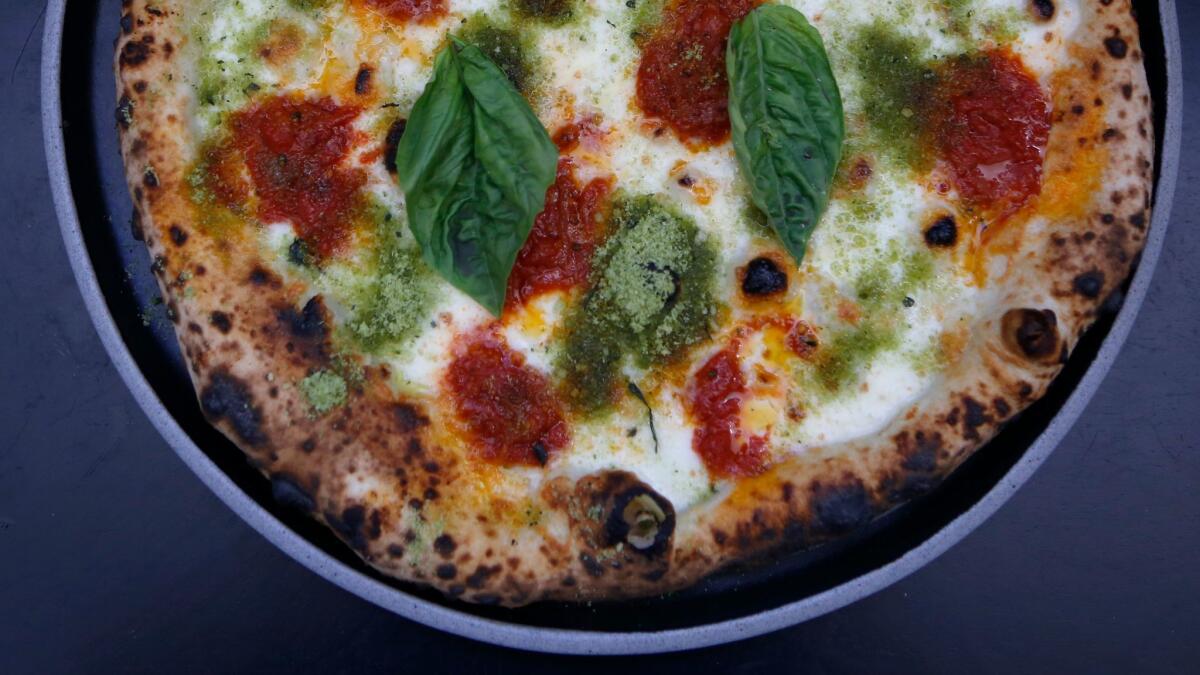 Neo Margarita pizza cooked in a wood oven by chef Daniele Uditi at Pizzana restauraunt.