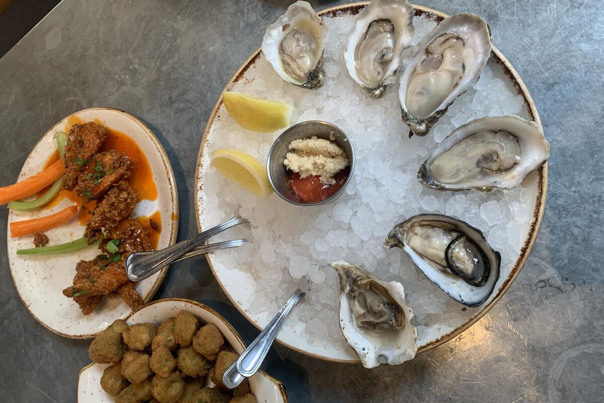 During happy hour, oysters at Rappahannock Oyster Bar are discounted to $2 per shell.