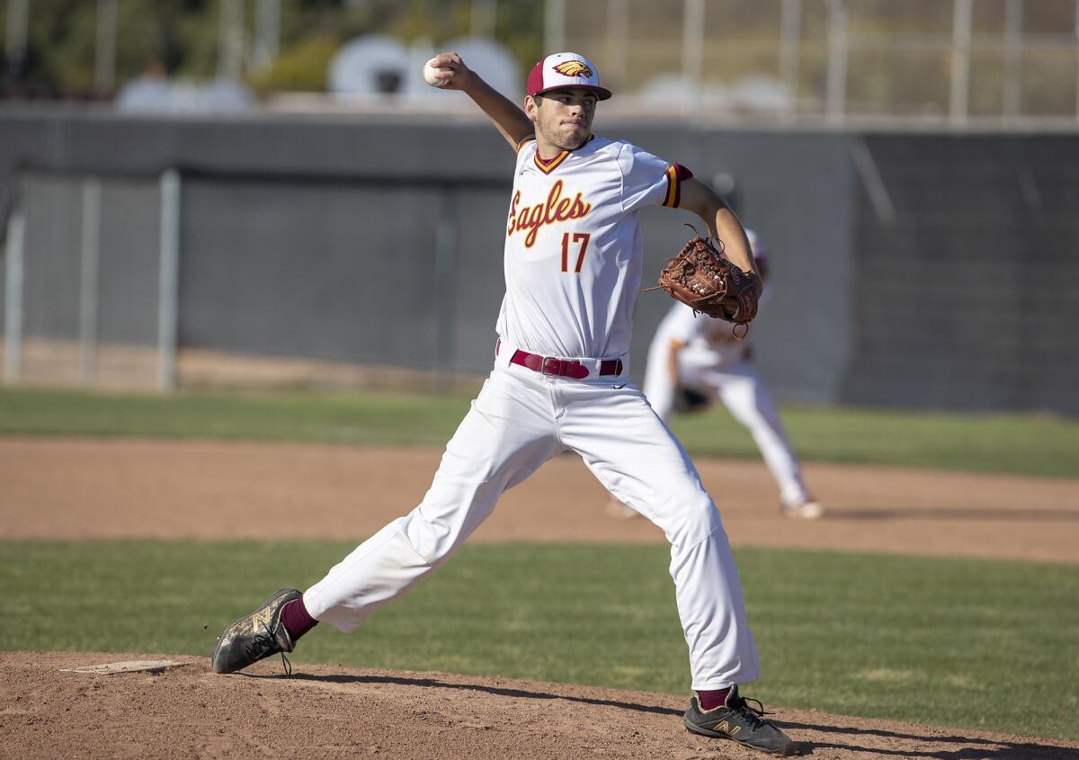 Estancia High's Justin Wood throws a complete game against Costa Mesa in an Orange Coast League game on Wednesday.