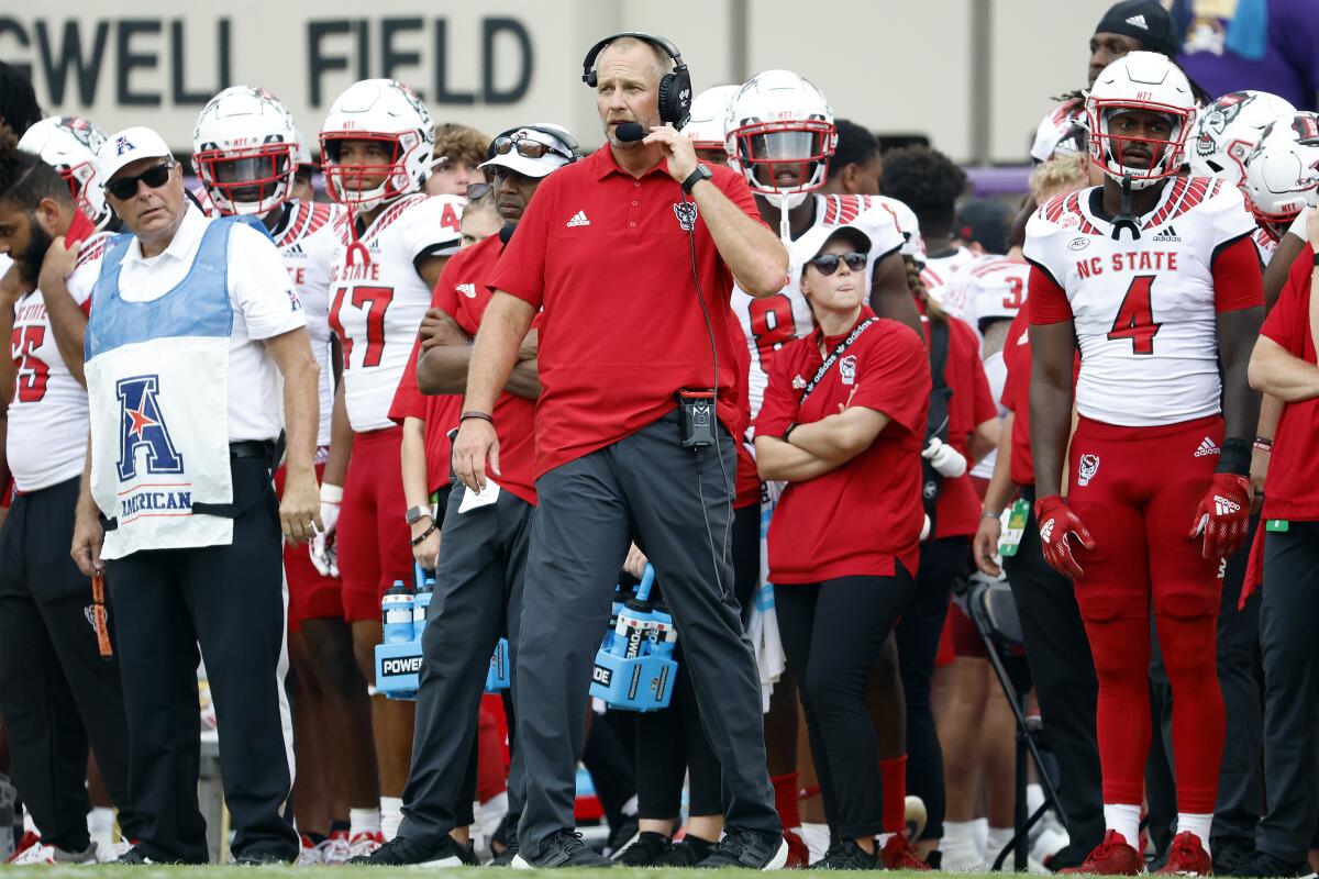 North Carolina State head coach Dave Doeren watches from the sidelines against East Carolina during the second half of an NCAA college football game in Greenville, N.C., Saturday, Sept. 3, 2022. (AP Photo/Karl B DeBlaker)
