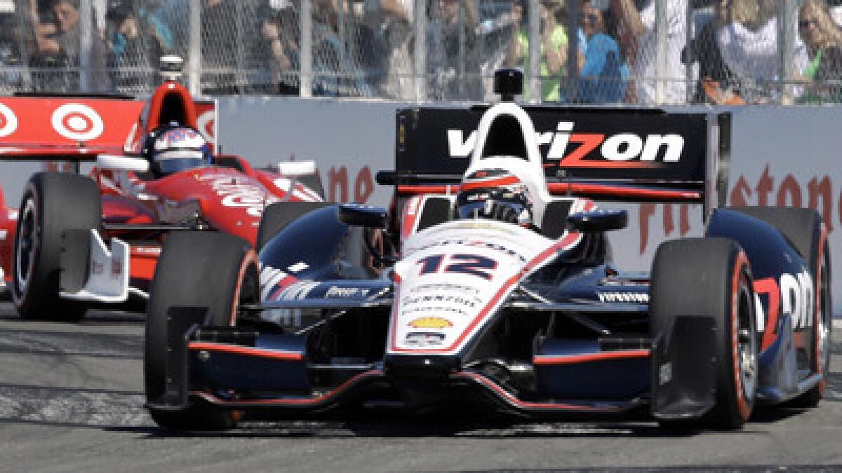 Will Power leads Scott Dixon during the early running of the IndyCar Series race in St. Petersburg, Fla., on Sunday.
