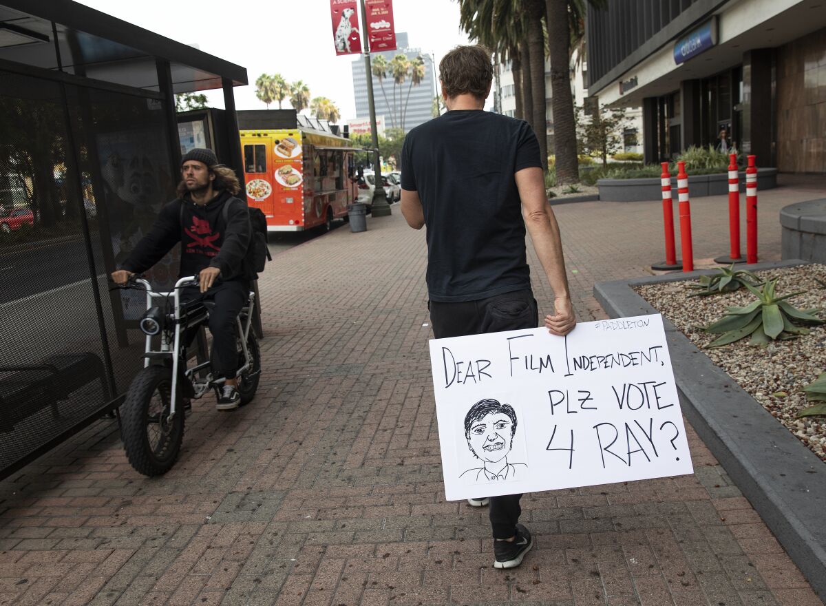 Mark Duplass heads toward the Film Independent offices.