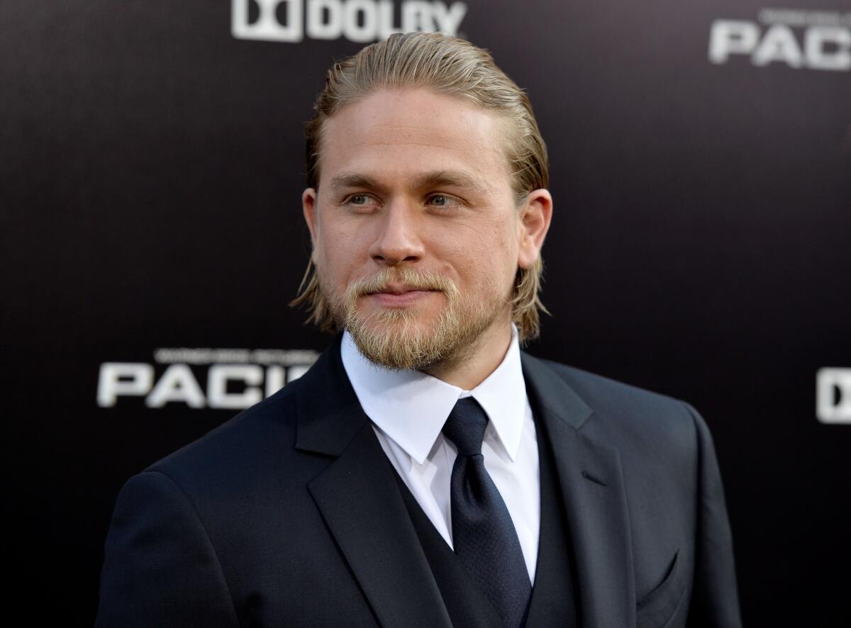 Charlie Hunnam, shown at the "Pacific Rim" premiere in Hollywood in 2013, may play King Arthur in Guy Ritchie's upcoming movie.