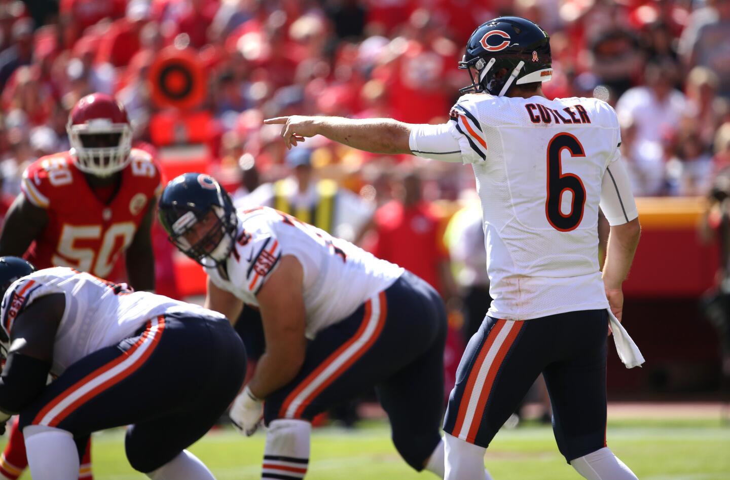 Jay Cutler directs the offense in the second quarter of a game against the Chiefs.