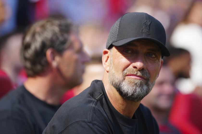 Liverpool's manager Jurgen Klopp follows the game during the English Premier League soccer match between Liverpool and Wolverhampton Wanderers at Anfield Stadium in Liverpool, England, Sunday, May 19, 2024. (AP Photo/Jon Super)