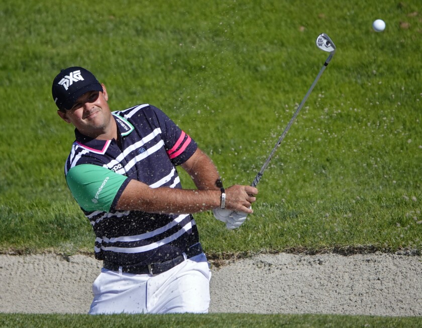 PGA Tour player Patrick Reed hits out of the sand on the North Course of Torrey Pines during a practice round Tuesday.