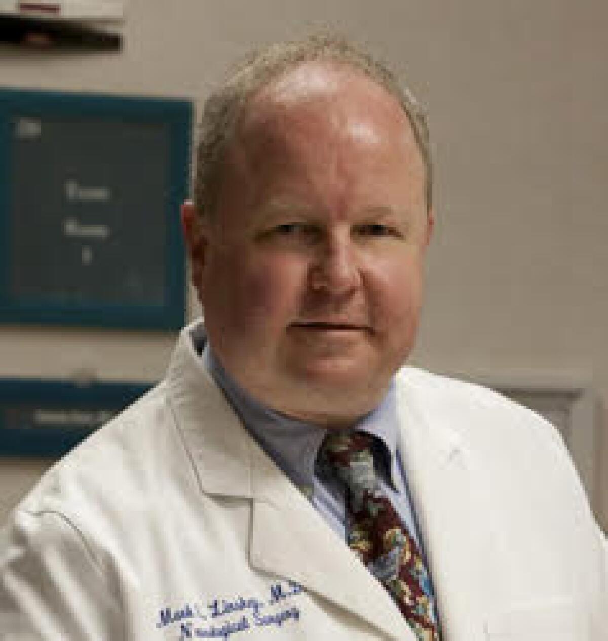 An Orange County jury has awarded $5.8 million in damages to Dr. Mark Linskey, a neurosurgeon and professor at UC Irvine.