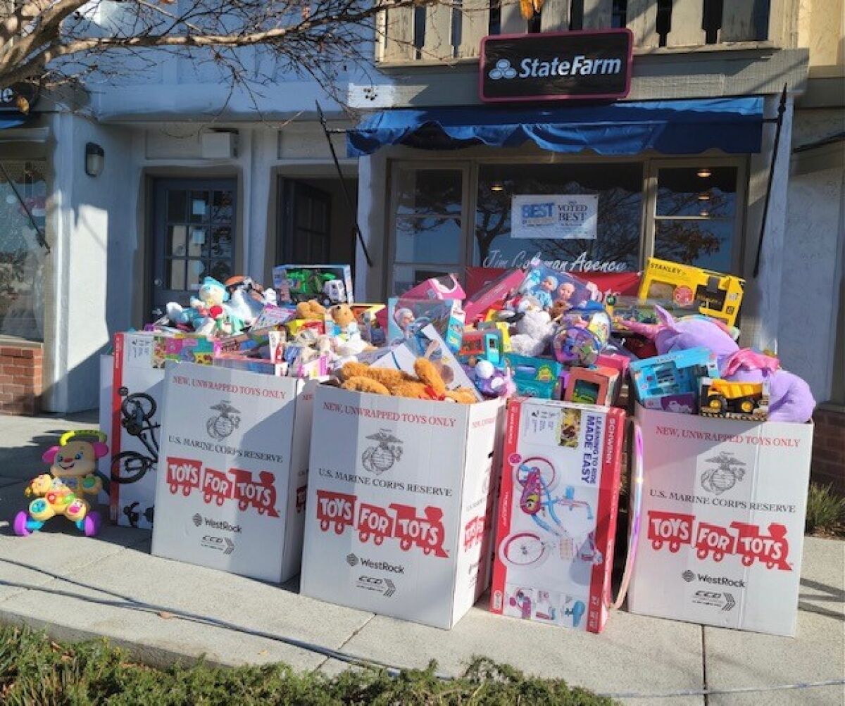 Toys for Tots donations dropped off at the Jim Coleman State Farm Insurance Agency in Del Mar last year.