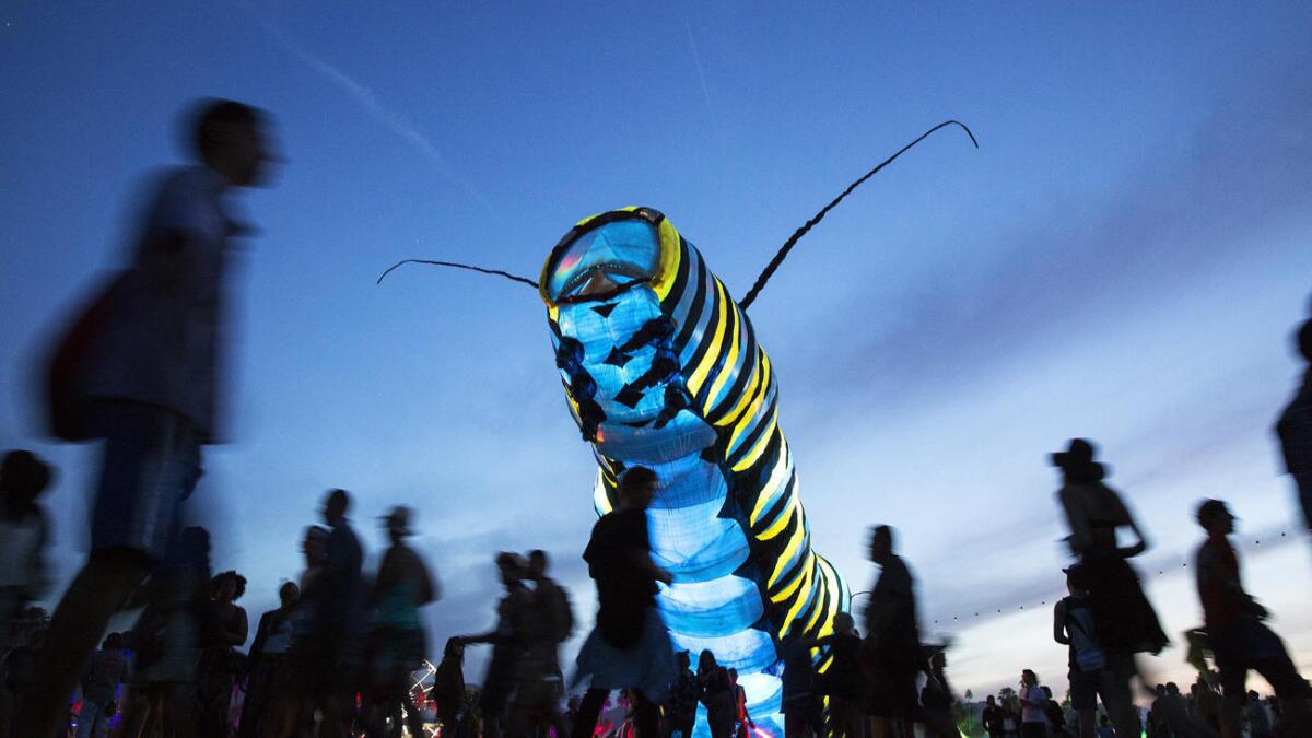 Poetic Kinetics' giant caterpillar moves between venues at the 2015 Coachella Valley Music and Arts Festival. Organizers said this year's art installations will be bigger and more elaborate than in years past.