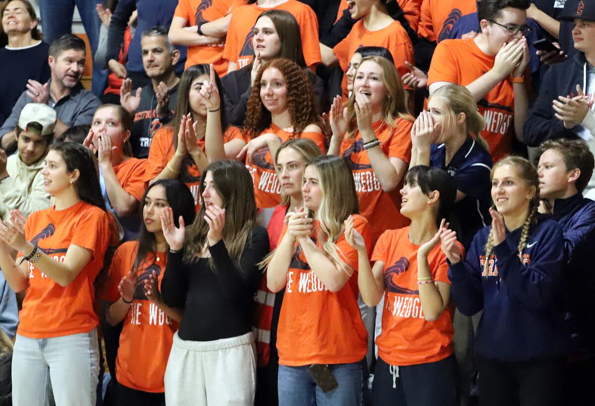 Pacifica Christian students cheer for their team during Wednesday's game.