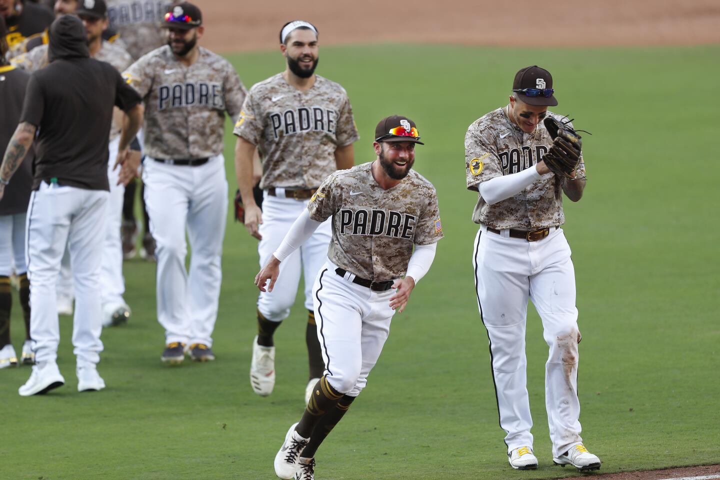 San Diego Padres party in clubhouse after clinching playoff spot