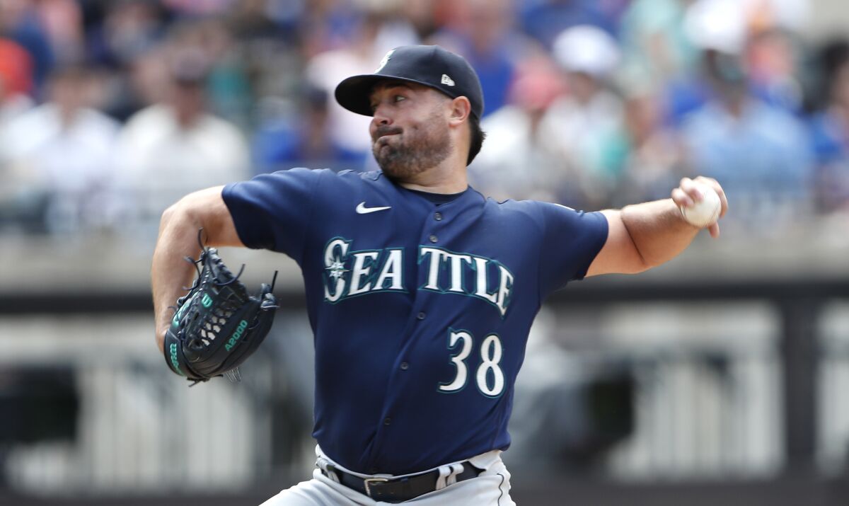 Seattle Mariners starting pitcher Robbie Ray (38) throws against the New York Mets during the fourth inning of a baseball game Sunday, May 15, 2022, in New York. (AP Photo/Noah K. Murray)