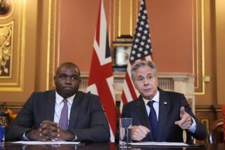 Secretary of State Antony Blinken, right, gestures as he participates with Britain's Foreign Secretary David Lammy, in a strategic dialogue meeting at the Foreign, Commonwealth and Development Office (FCDO) in London, Tuesday, Sept. 10, 2024. (AP Photo/Mark Schiefelbein, Pool)