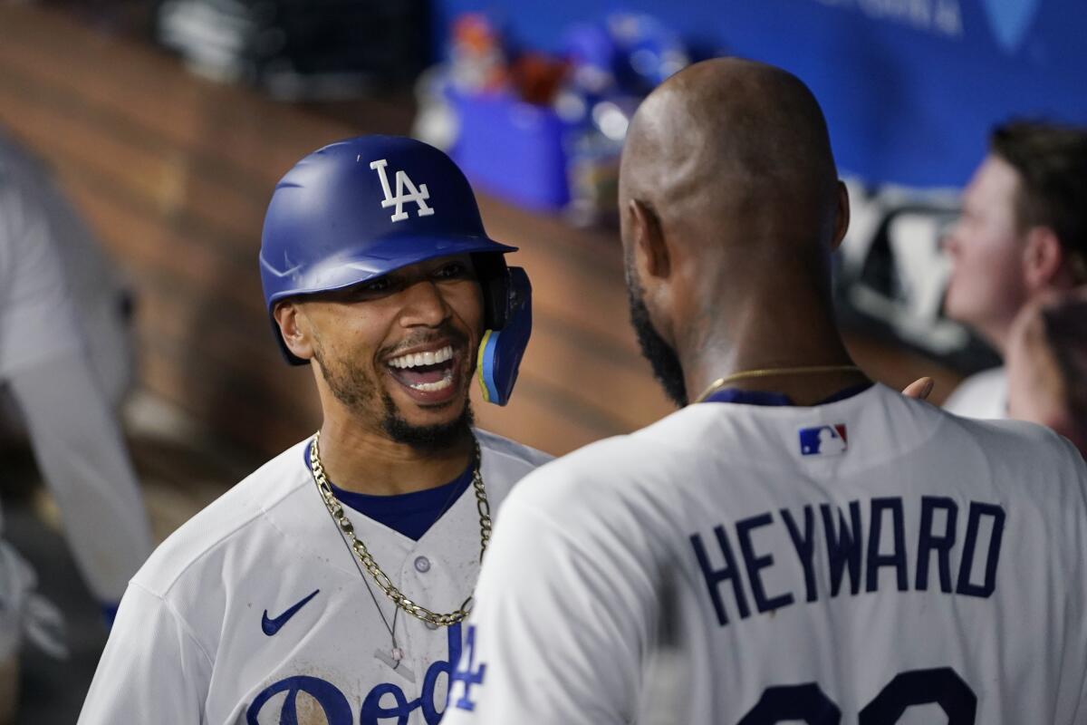 Betts hits career-high 36th homer and Dodgers pound out 16 hits in