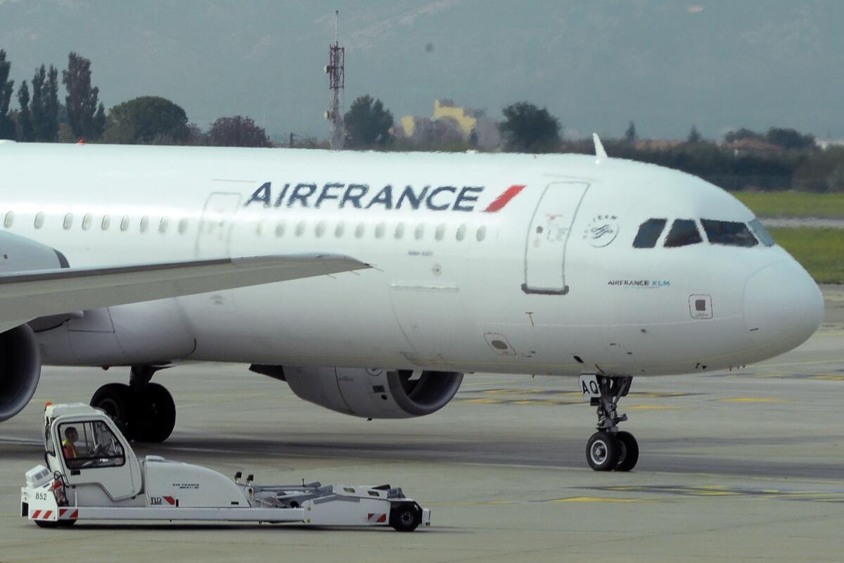 Two Air France planes bound for Paris were diverted and grounded Tuesday evening because of bomb threats, according to the airline.