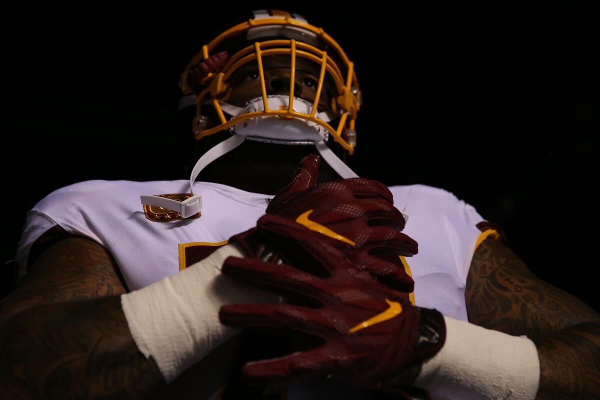 The Redskins' Trent Williams enters the field to take on the the Eagles on Oct. 23, 2017, in Philadelphia. 