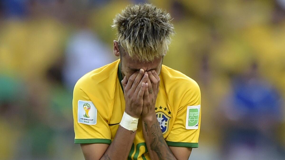 Brazil forward Neymar celebrates following the team's victory over Chile on penalty kicks at the World Cup on Saturday. Can Brazil overcome its recent struggles to retain its position as a World Cup favorite?