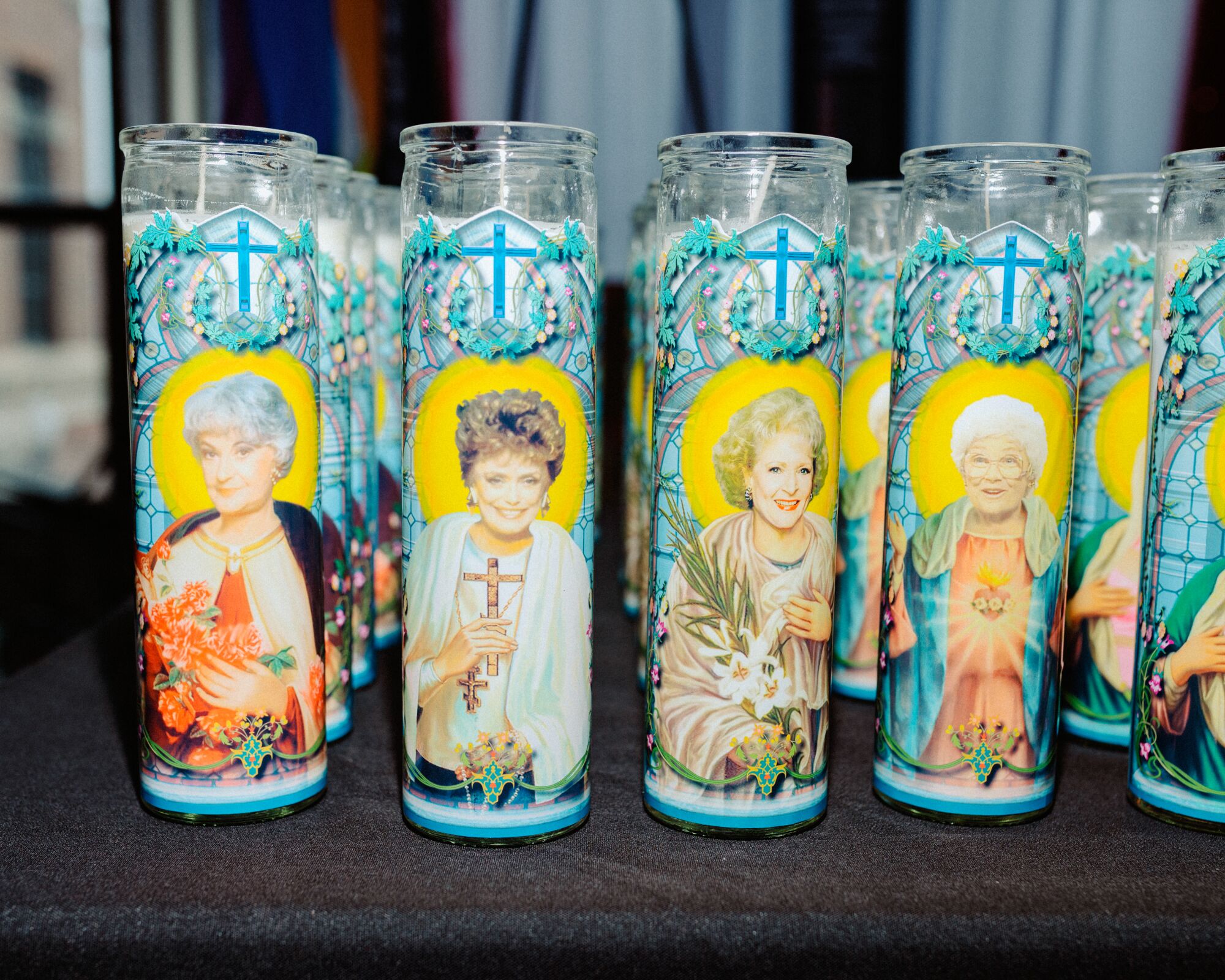 Religious candles with characters from "The Golden Girls" on them.
