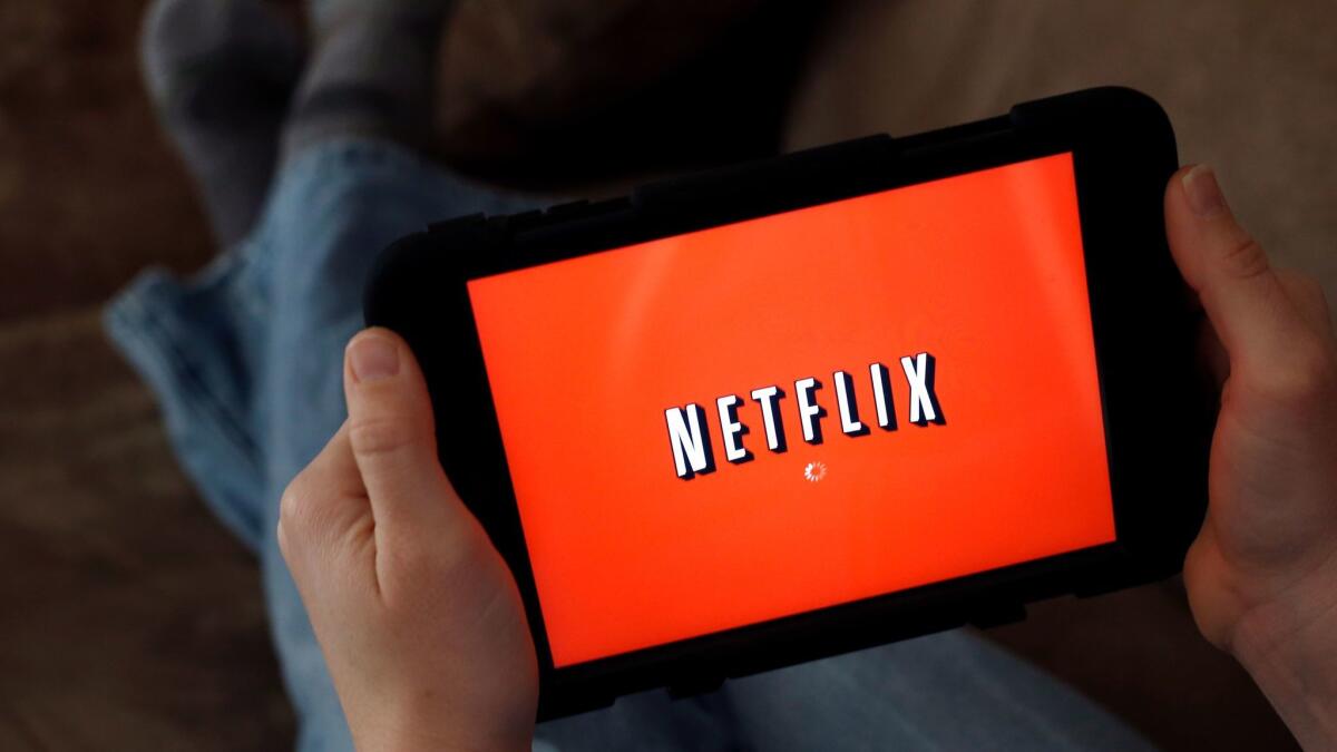 Netflix will start charging $11 a month instead of $10 for its most popular U.S. streaming plan.
