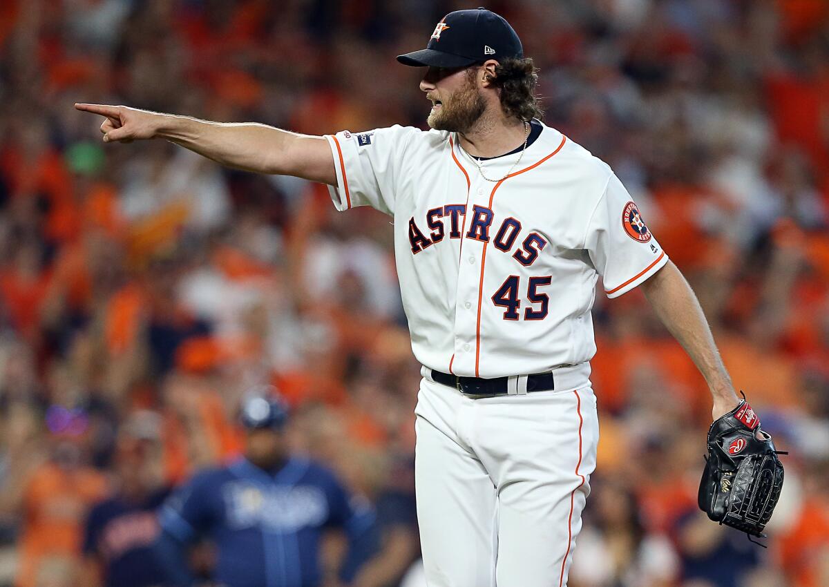 Houston Astros starter Gerrit Cole gestures during Game 5 of the ALDS against the Tampa Bay Rays on Oct. 10.