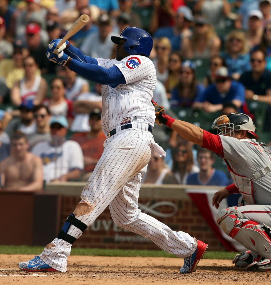 Jorge Soler goes after a high fast ball to end the game.