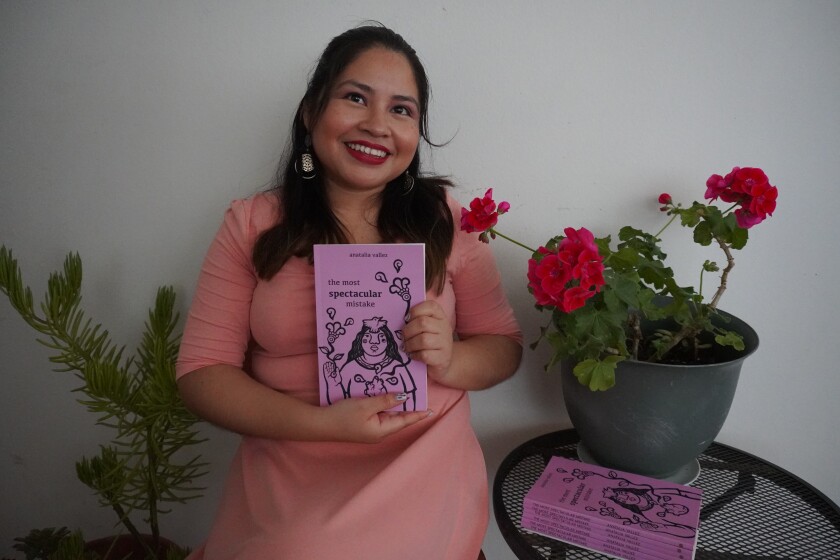 Anatalia Vallez holds her debut poetry collection "the most spectacular mistake," published by FlowerSong Press in April with illustrations by John Jairo Valencia.