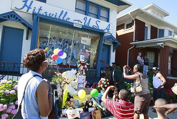 Fans gather outside of the Motown Museum, Hitsville USA, at a makeshift memorial for pop star Michael Jackson in Detroit. Hitsville USA was the home for Motown Records.