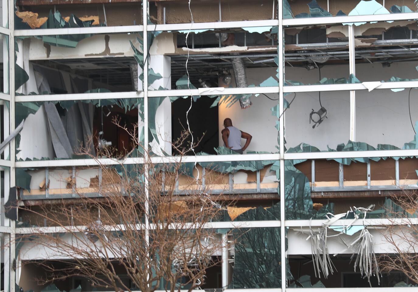 All the panes of glass in a glass office building are shattered in Lake Charles, La.