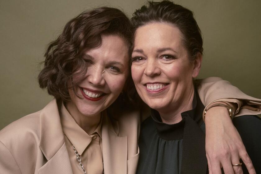 UNITED KINGDOM, LONDON- DECEMBER 2, 2021: Actress and director Maggie Gyllenhaal(left) and actress Olivia Coleman are photographed for the film "The Lost Daughter" at the SOHO Hotel in London. CREDIT: Tom Jamieson / For The Times