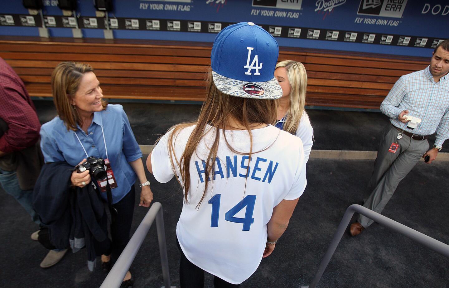 Photo Gallery: Olympian Kate Hansen throws out first pitch of Dodger game