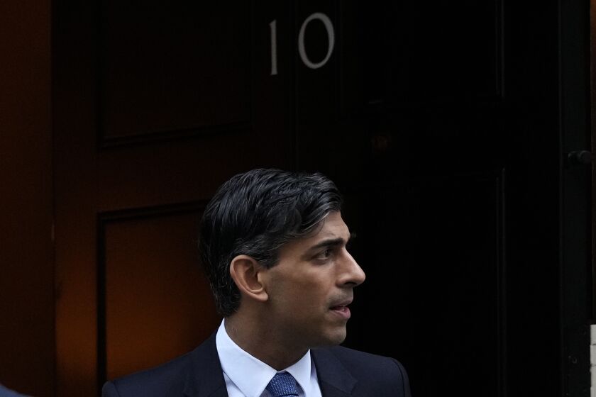 Britain's Prime Minister Rishi Sunak leaves 10 Downing Street to attend the weekly Prime Minister's Questions session in parliament in London, Wednesday, Jan. 18, 2023. (AP Photo/Frank Augstein)
