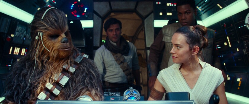 Joonas Suotamo (as Chewbacca), Oscar Isaac, Daisy Ridley and John Boyega in "Star Wars: The Rise of Skywalker."