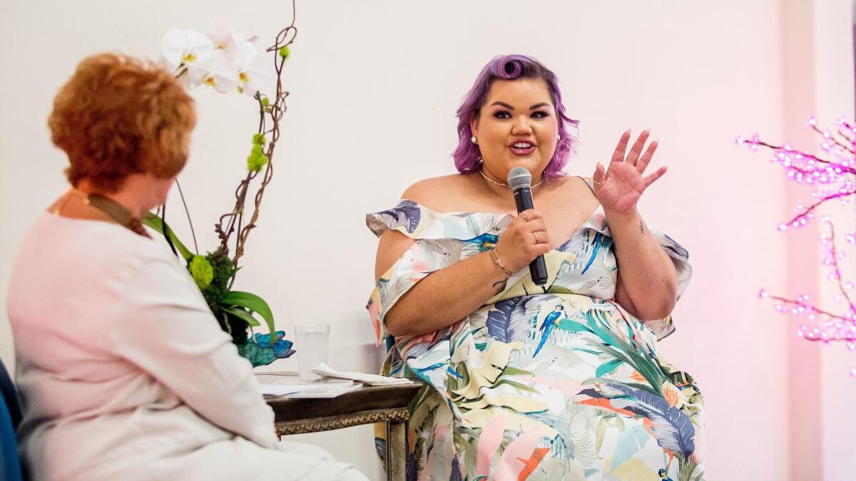 Working Wardrobes CEO Jerri Rosen interviews Ashley Nell Tipton, the winner of "Project Runway" Season 14, during an event on July 19.