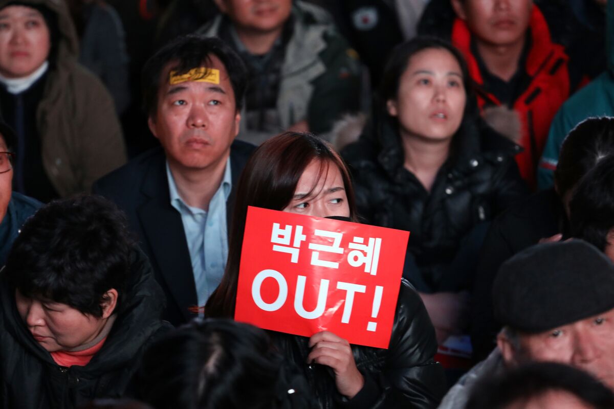 Thousands of South Koreans take to the streets of Seoul on Nov. 12, 2016, to demand the resignation of President Park Geun-hye.