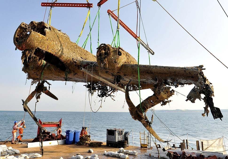 The wreck of a German World War II Dornier Do 17 plane is raised out of the English Channel.