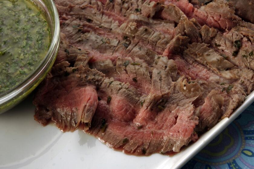 Grilled flank steak with chimichurri.