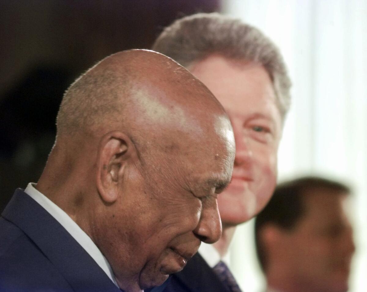 Herman Shaw, 94, a victim of the Tuskegee experiment, after receiving an official apology from President Clinton on May 16, 1997, in the White House.