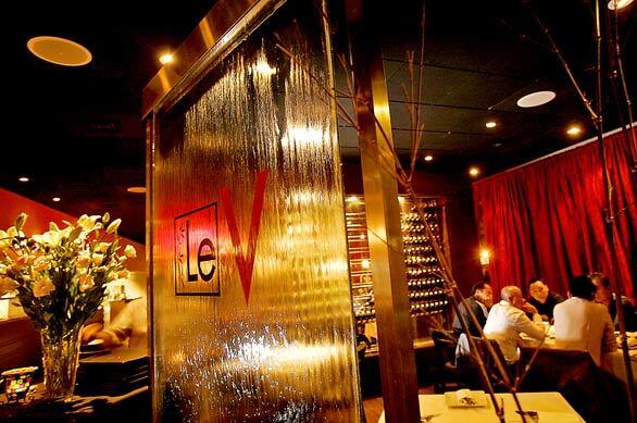 When it comes to Vietnamese cuisine, "peoples expectations are different now, says Cecilia Le, a former financial analyst who owns 6-month-old Le V Cuisine in Fountain Valley. A wall of wines bisects Le V's bistro-Moderne dining room.