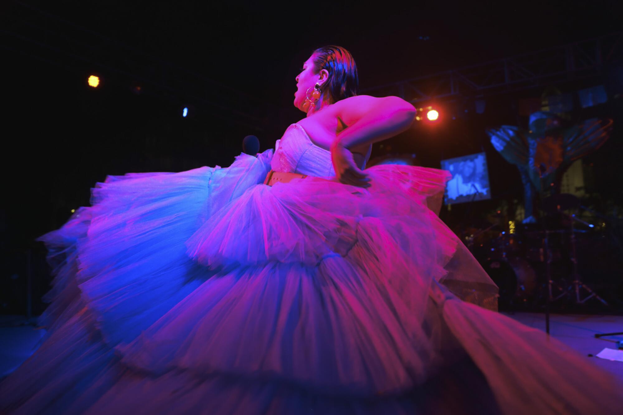 Photograph of a dancer in a billowy gown 