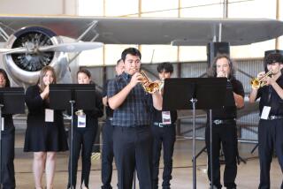 Rudy Xool plays the trumpet during the groundbreaking of the Orange County Music & Dance campus.