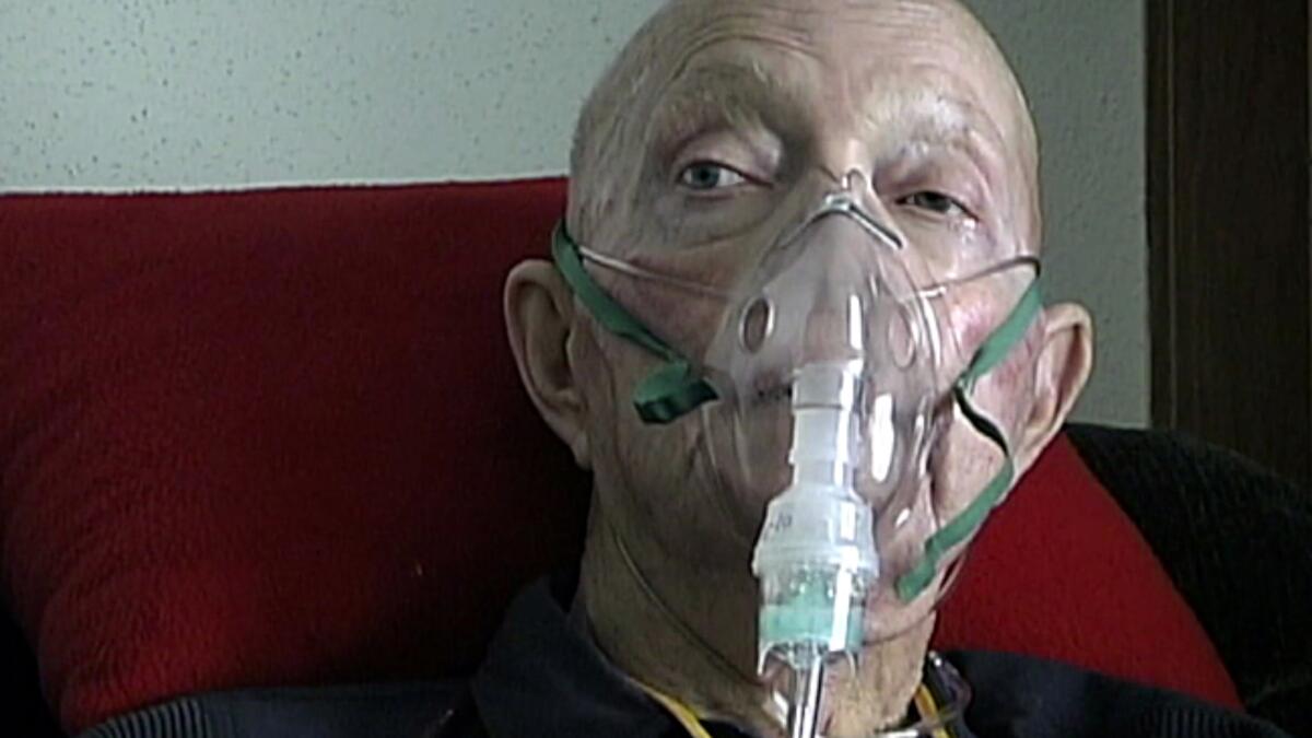 Ray Alkofer breathed with a respirator during the final year of his life.