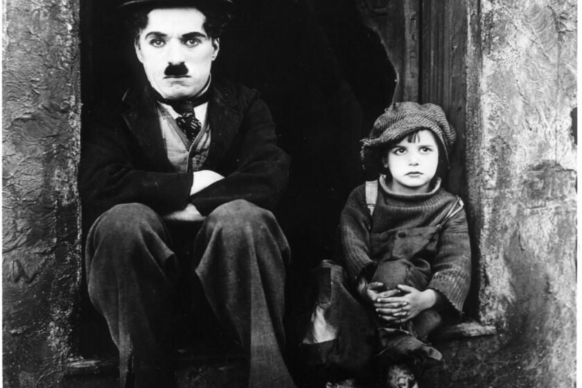 Charlie Chaplin & Jackie Coogan in "THE KID" 1920 courtesy of Marc Wanamaker/Bison Archive. SCREENING ROOM JUNE 14