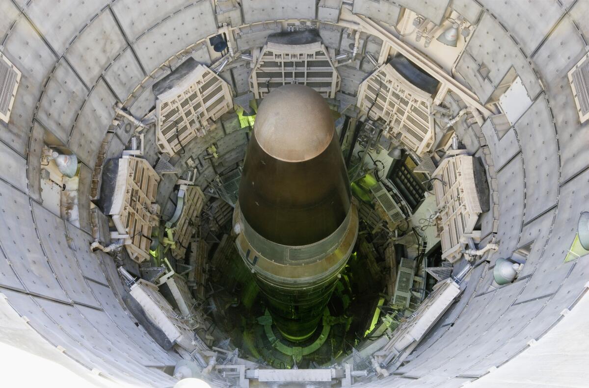 A Titan nuclear intercontinental ballistic missile is loaded in a silo in Arizona.