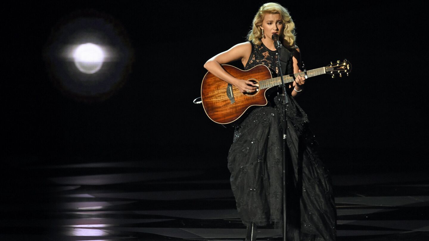 Tori Kelly performs "Hallelujah" during an In Memoriam tribute at the Emmy Awards.