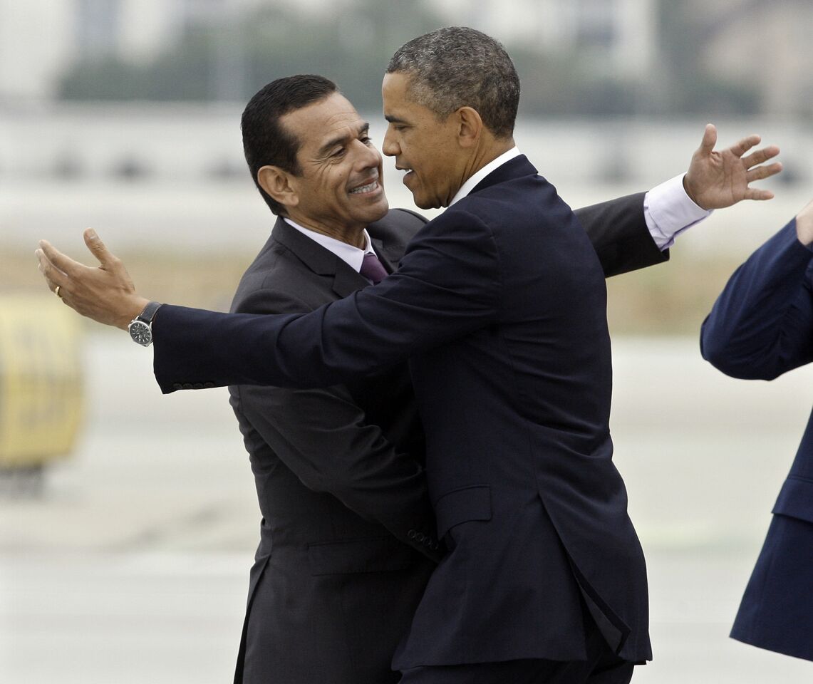 President Obama greets L.A. Mayor Antonio Villaraigosa at Los Angeles International Airport in 2013.