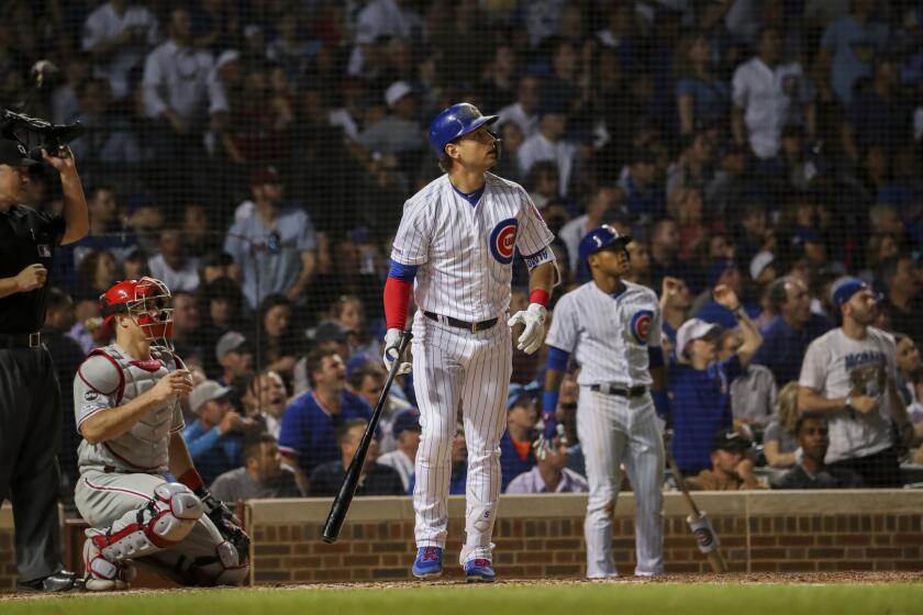 Cubs center fielder Albert Almora Jr. watches his grand slam during the fifth inning against the Phillies on May 22, 2019, at Wrigley Field.