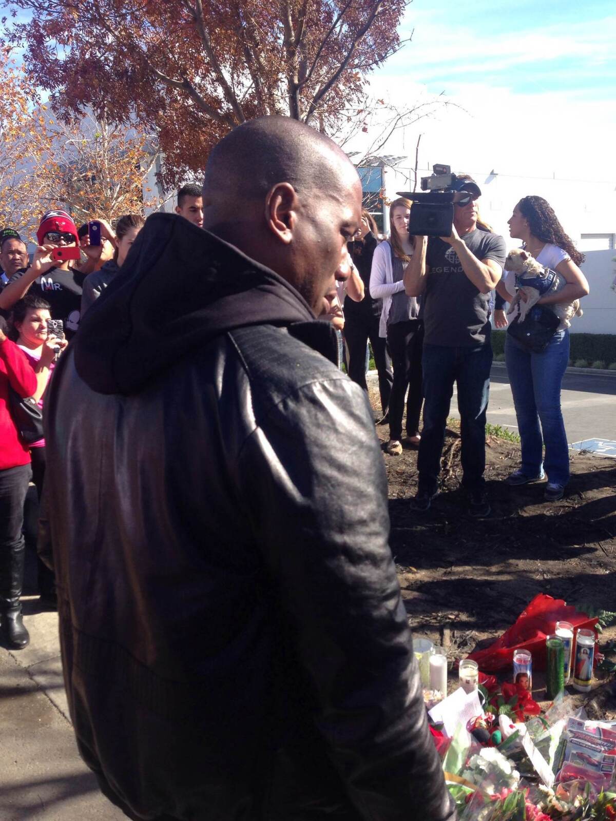 Actor Tyrese Gibson, Paul Walker's co-star on the "Fast and the Furious" films, pays his respects at the makeshift memorial site at the scene of the crash.
