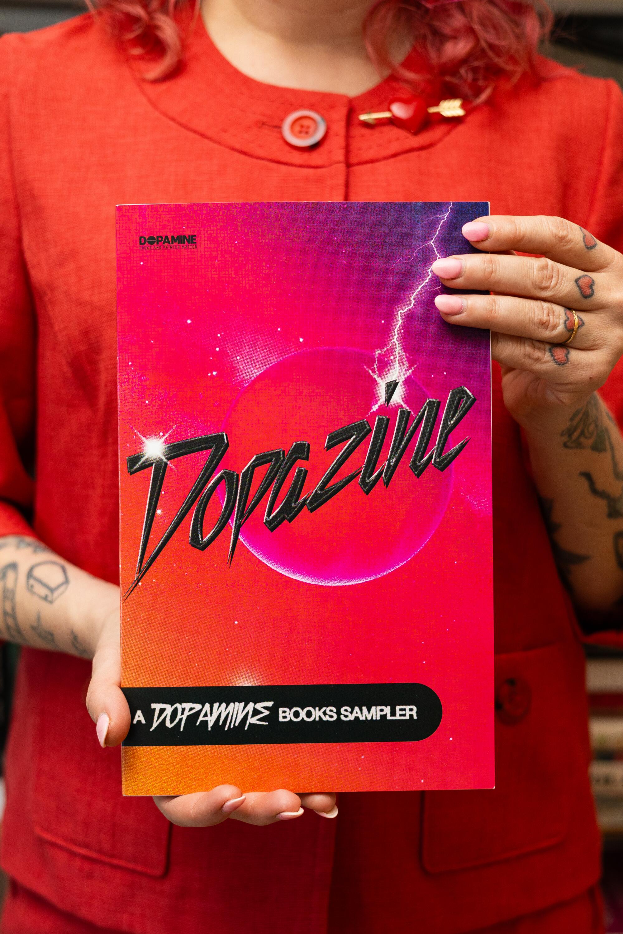 Michelle Tea holds a copy of "Dopazine"